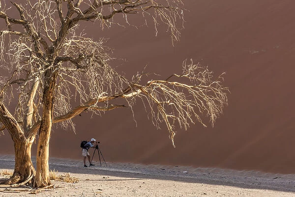 Africa, Namibia, Sossusvlei. Photographer at Dune 45