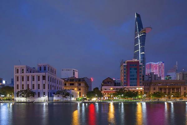 Bitexco Financial Tower and Ben Ngde River at dusk, Ho Chi Minh City, Vietnam