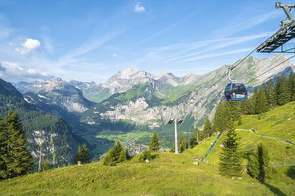 Cable car on way to Oeschinensee lake with Kandersteg in background, Bernese Oberland
