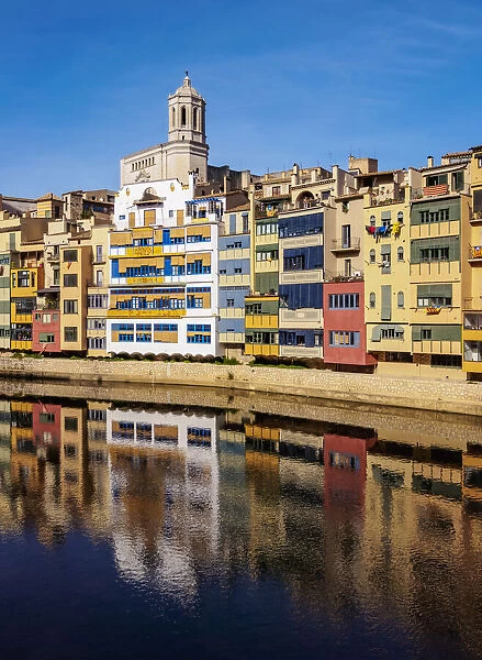 Colourful houses and the cathedral reflecting in the Onyar River, Girona or Gerona