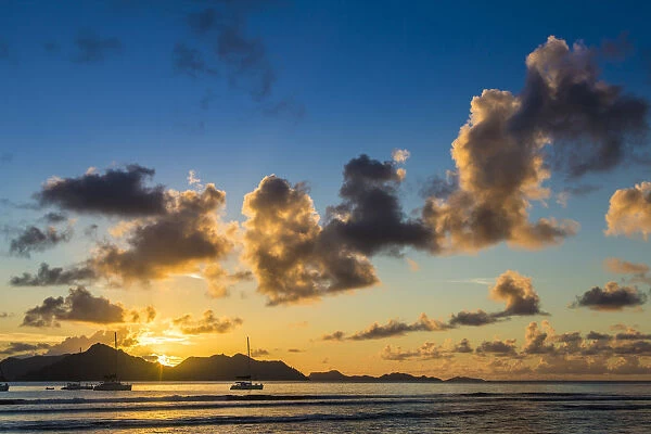 Cumulus cloads at sunset, La Digue, Seychelles