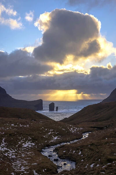 Drangarnir sea stacks at sunset. Faroe Islands