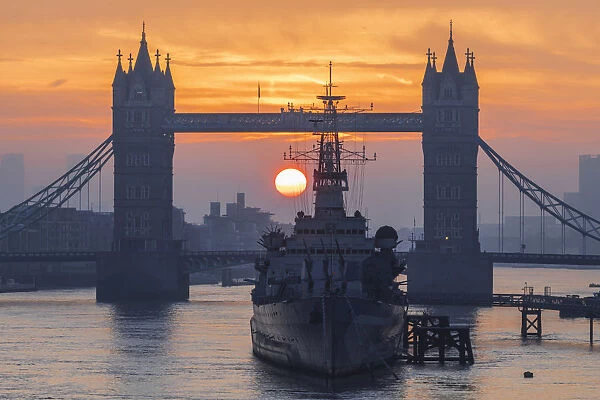 England, London, Tower Bridge and Museum Ship HMS Belfast at Sunrise