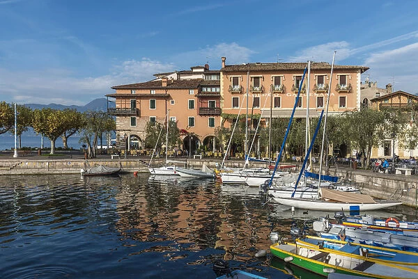 europe, Italy, Veneto. a sunny afternoon at Garda Lake town Torri del Benaco