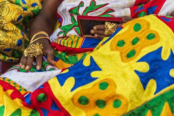 Ghana, Kumasi, Akwasidae festival. Colorful dresses and gold jewellery esposed at