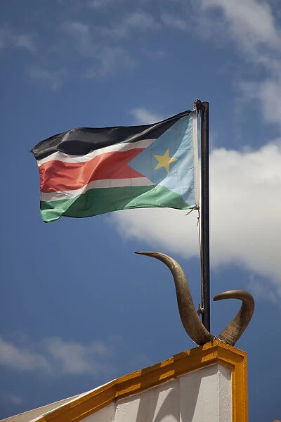 Juba, South Sudan. The South Sudanese Flag flying at the mausoleum of John Garang