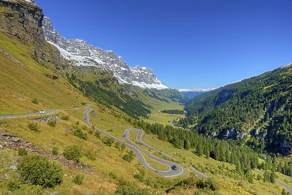 Klausenpass road with Ortstock mountain and Urnerboden at fall, Glarus, Switzerland