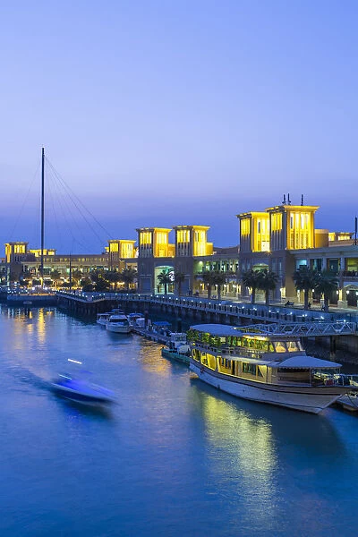 Kuwait, Kuwait City, Souk Shark Mall and Kuwait harbour, illuminated at dusk