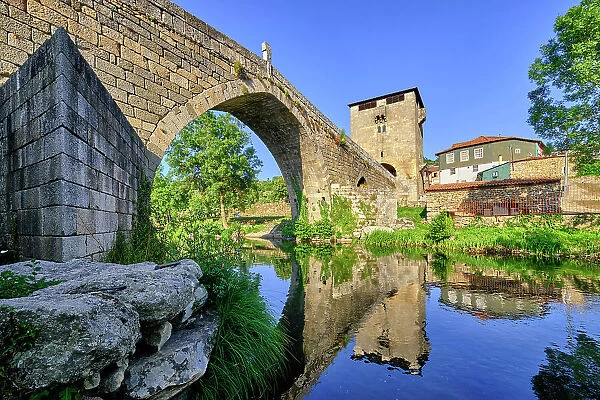 The medieval bridge of Ucanha, dating back to the 12th century, over the Varosa river. The Tower at one of the entrances was the first in the country to demand toll collection to enter the dominion of the monastery of Santa Maria de Salzedas