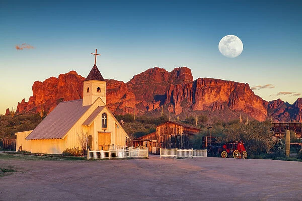 Moon over Elvis Memorial Chapel & Superstition Mountains, near Phoenix, Arizona, USA