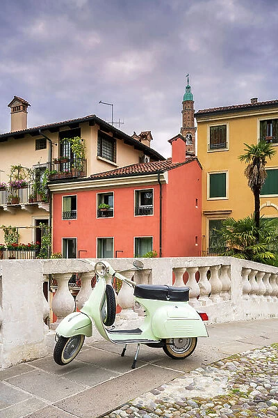 Piaggio Vespa scooter parked in the old town, Vicenza, Veneto, Italy