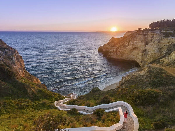 Portugal, Algarve, Lagoa, carvoeori, steps leading to beach at sunset (MR)