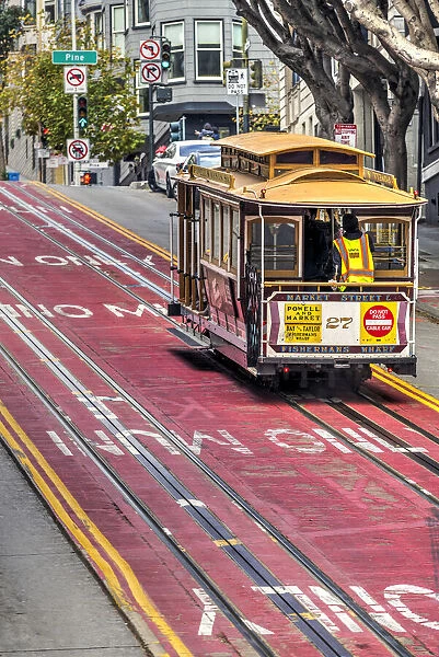 Powell and Market line cable car climbing a steep street, San Francisco, California, USA