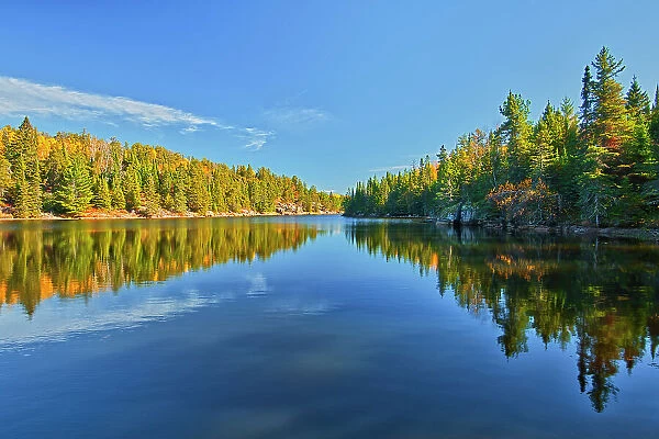 Reflection in autumn on Blindfold Lake. Storm Bay Road. Near Kenora, Ontario, Canada