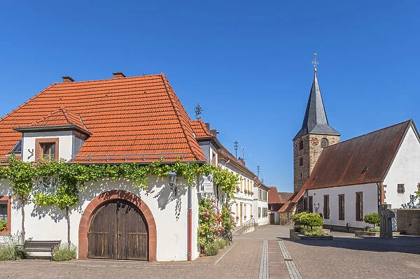 Restaurant and church at Oberrottenbach, Palatinate wine road, Rhineland-Palatinate