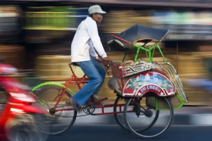 Framed Print : Rickshaw driver Print, Yogyakarta, Java, Indonesia Framed Print : Rickshaw driver Print, Yogyakarta, Java, Indonesia