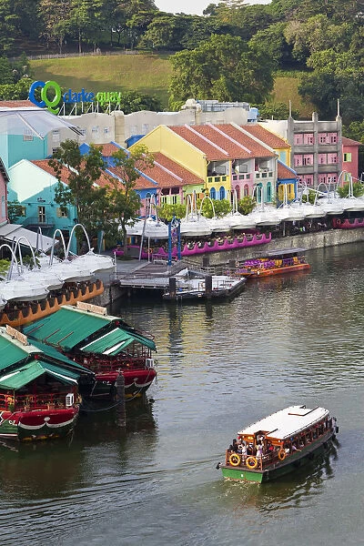 The Singapore River flows past Clarke Quay, a new area of nightlife restaurants and bars