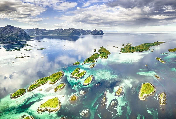 Small idyllic islands of Bergsoyan along the fjord, aerial view, Hamn I Senja, Skaland