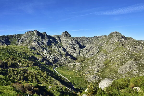 The source of the Zezere river. Covao da Ametade and the three peaks from where flows