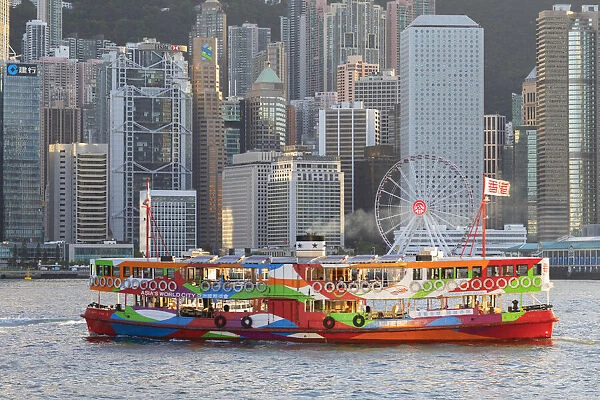 Star Ferry in Victoria Harbour with skyscrapers of Central, Hong Kong