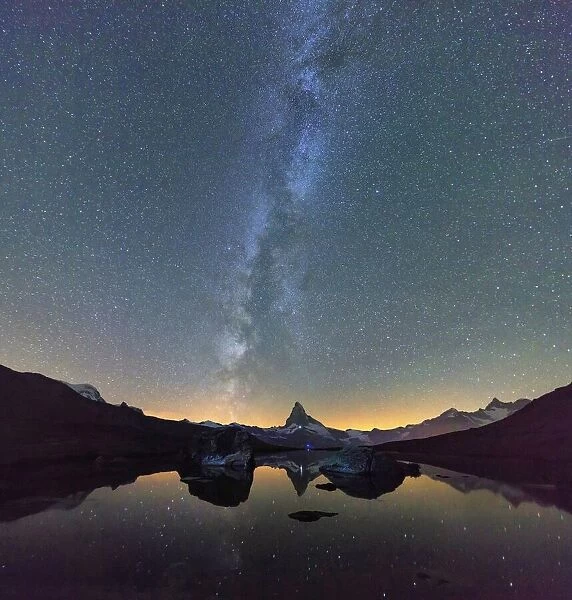 Stars and Milky Way above the Matterhorn reflected in Lake Stellisee Zermatt Canton