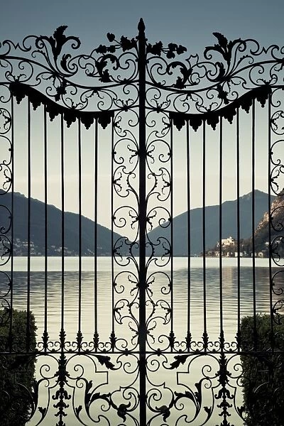 Switzerland, Ticino, Lake Lugano, Lugano, Parco Civico gate lake view, dawn