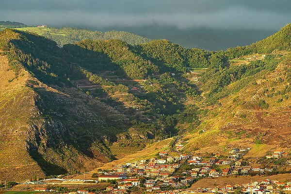 Town of Canical under mountains at sunrise, Machico, Madeira, Portugal