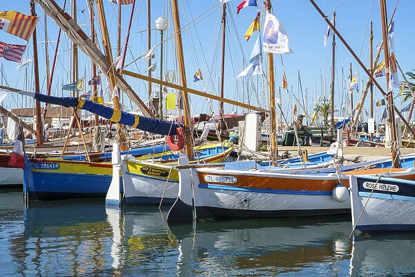 Traditional colorful wooden fishing boat in the port harbor at Sanary-sur-Mer, Var