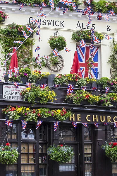 UK, England, London, Kensington, The Churchill Arms Pub with Union Jack bunting to