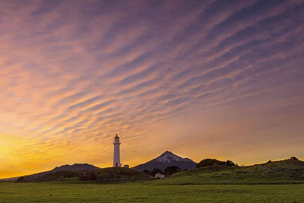 Unusual cloud formations at sunrise, from Cape Egmont lighthouse, Taranaki, New Zealand