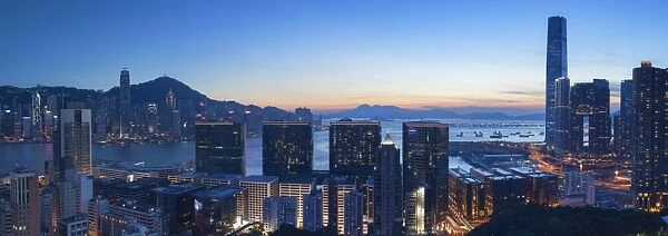 View of Hong Kong Island and Tsim Sha Tsui skylines at sunset, Hong Kong