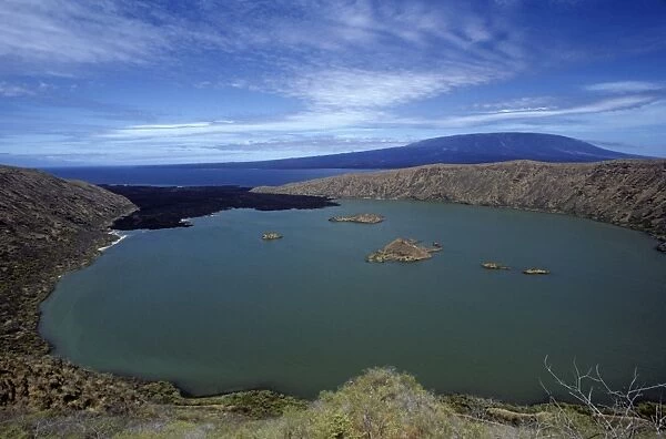 Beagle crater and salt lake with Fernandina beyond. Beagle Crater, Isabela Island, Galapagos Ecuador