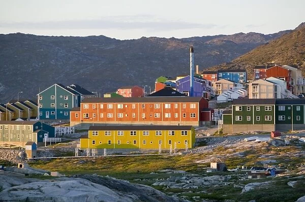Colourful houses in Illulisat on Greenland. Ilulissat is a UNESCO World Heritage Site because of the Jacobshavn Glacier or Sermeq Kujalleq which is the largest glacier outside Antarctica. The glacier drains 7% of the Greenland ice sheet and