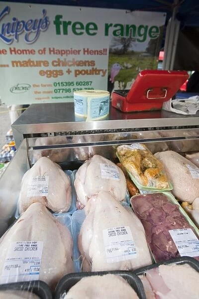 Locally reared free range chickens on a farmers market in Kendal, Cumbria UK. Farmers markets are a great way for farmers to diversify and cut down hugely on food