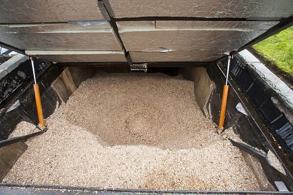 The woodchip hopper for a biofuel boiler in the grounds of the Langdale Timeshare in the Lake District, UK. Since the instalation of the biofuel boiler, which replaced an LPG gas boiler, the company has saved £30, 000 a year in running costs