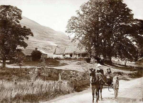 View of thatched buildings at Lochearnhead. Date: 1892