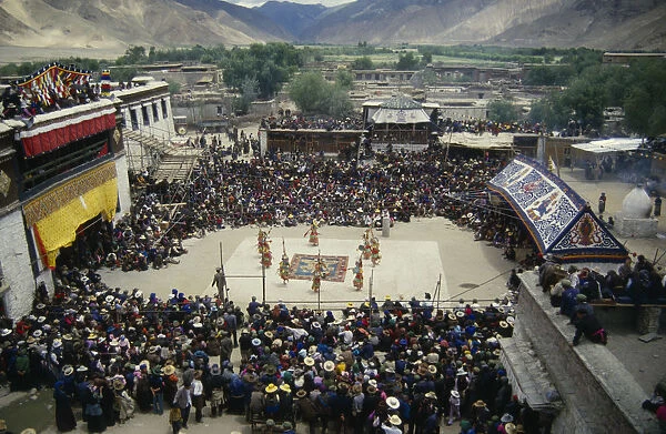 10000602. china, tibet, samye monastery, crowds and dancers at tibetan full moon festival