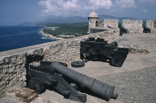20034174. CUBA Santiago de Cuba Castillo de Morro with canons on the roof