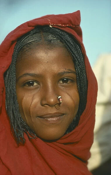 20039766. SUDAN Tribal People Portrait of a young Eritrean woman with scarified cheeks