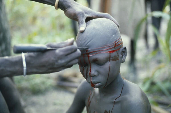 20048684. SUDAN Scarification Dinka initiation into manhood