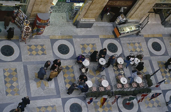 20079601. ITALY Campania Naples Looking down on cafe tables inside Galleria Umberto