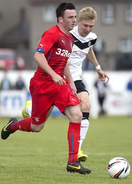 Rangers Calum Gallagher Goes Head-to-Head with 2003 Scottish Cup Champions Brora Rangers at Dudgeon Park
