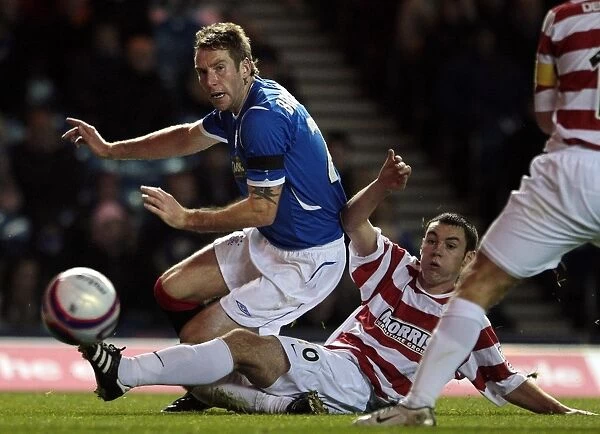 Rangers Kirk Broadfoot Repels Hamilton's Gibson in CIS Insurance Cup Quarterfinal at Ibrox Stadium (2-0)