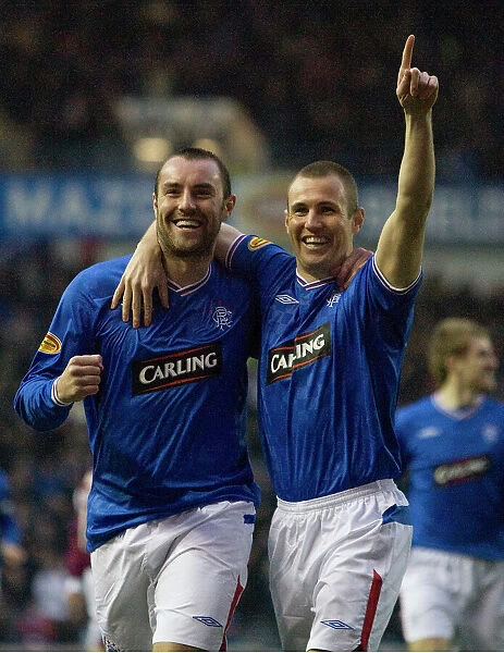 Rangers Kris Boyd and Kenny Miller: Unstoppable Duo Celebrates 3-0 Victory over St. Johnstone at Ibrox