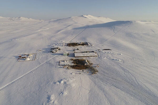 An aerial view shows the nomad camp of farmer Tanzurun Darisyu in the snow-covered steppe