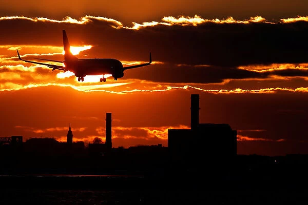 An American Airlines flight lands at Logan International Airport in Boston