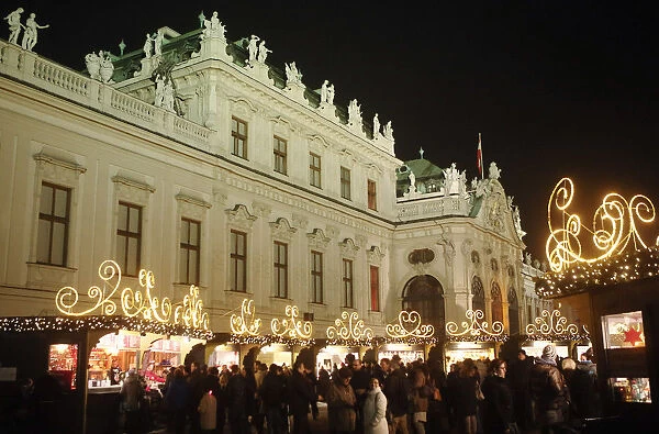 Belvedere palace is pictured behind an advent market in Vienna