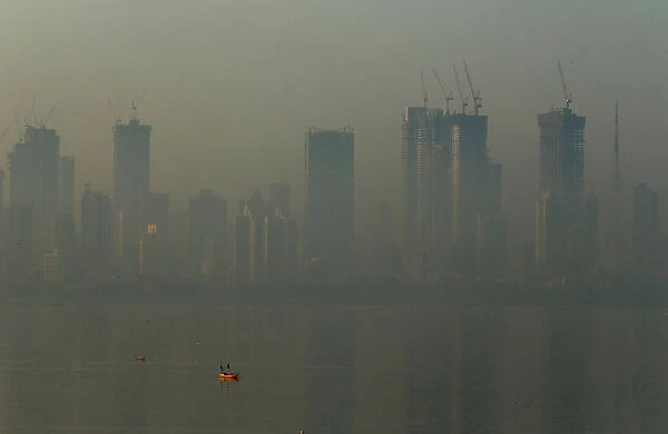Buildings are seen shrouded in smog in Mumbai