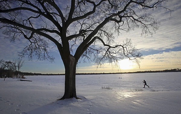 A cross country skier makes his way across Lake Calhoun in Minneapolis