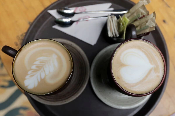 Cups of cappuccino are seen at a Juan Valdez store in Bogota